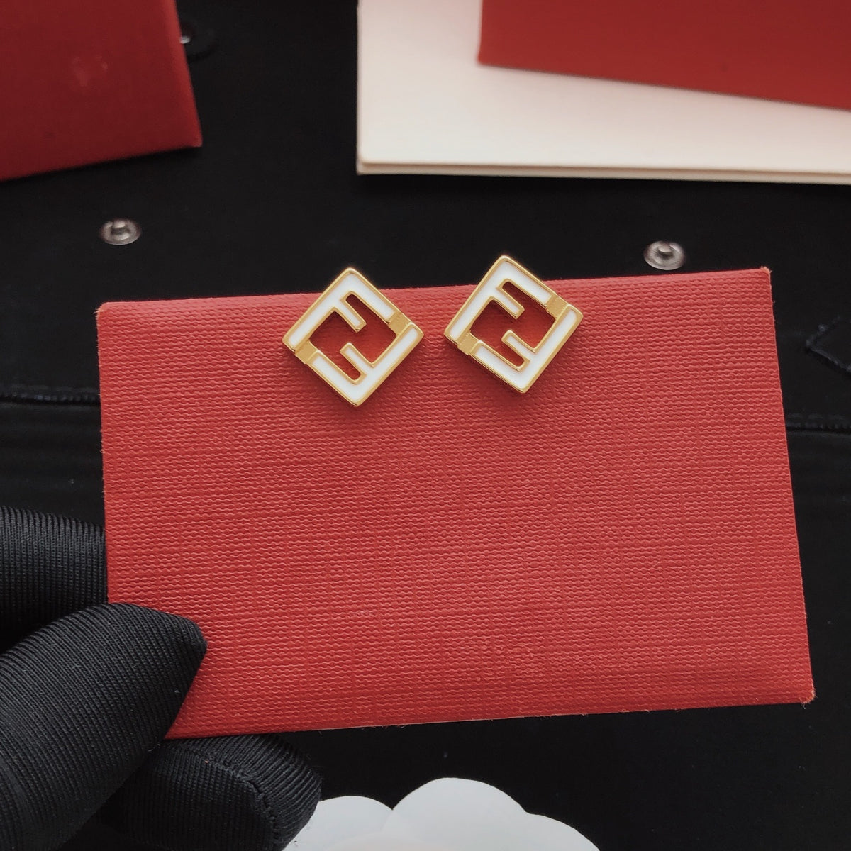 White square hollow earrings