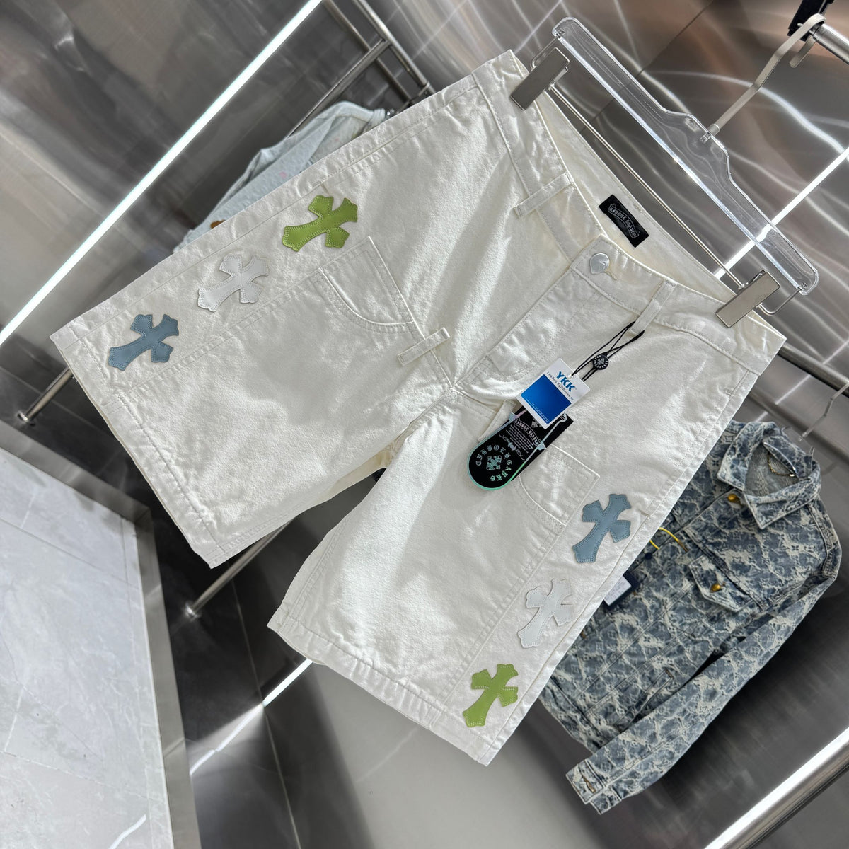 Spliced cross denim shorts
