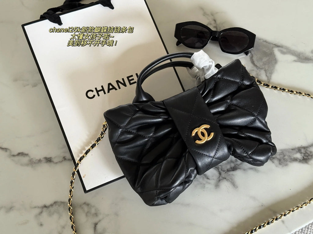 Bow handle chain sheepskin bag