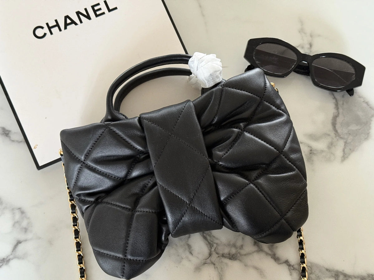 Bow handle chain sheepskin bag