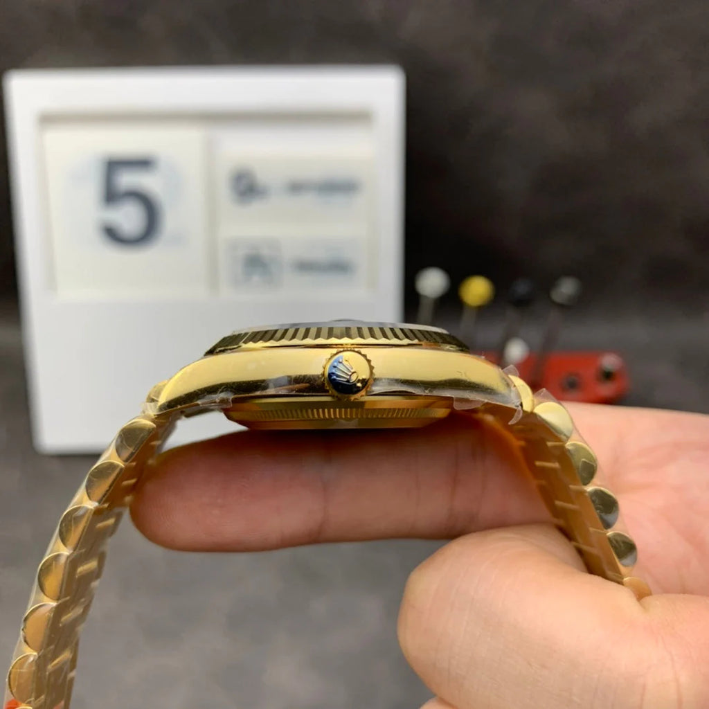 Yellow gold - Green dial - Automatic - 36mm
