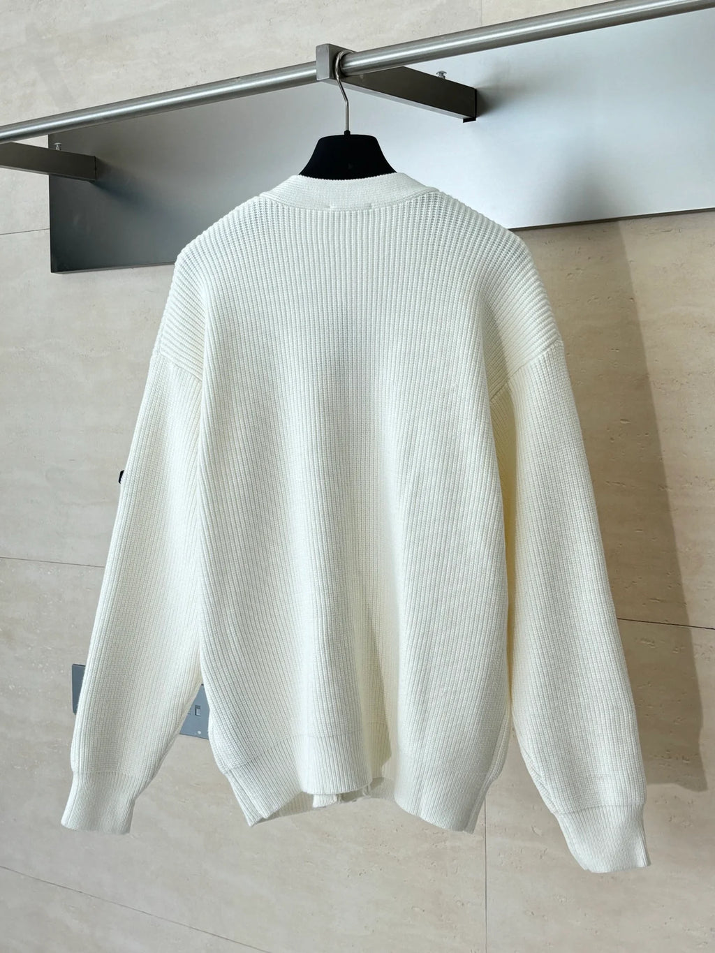 Knitted cardigan sweater with armband