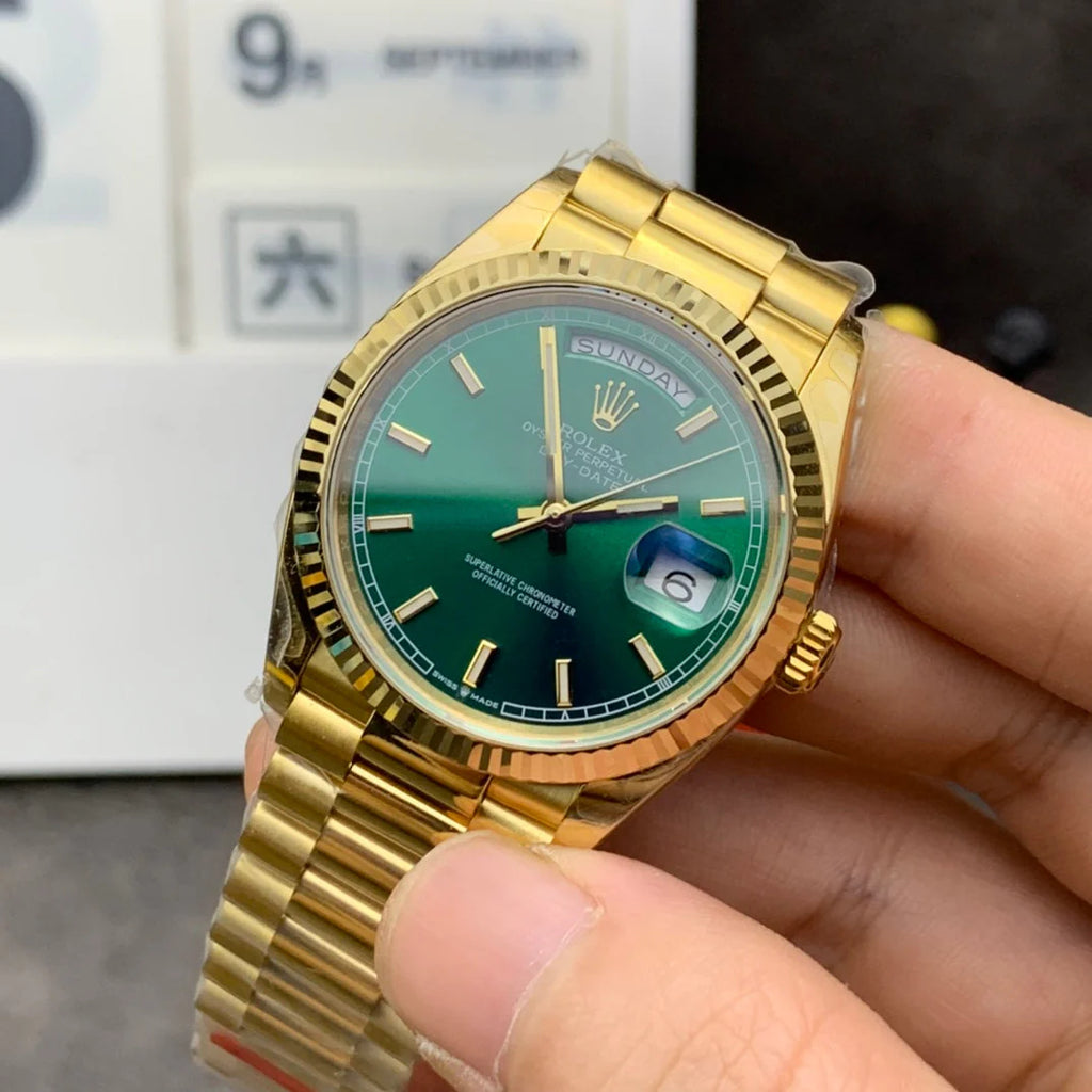 Yellow gold - Green dial - Automatic - 36mm