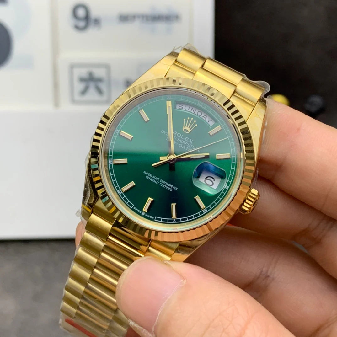 Yellow gold - Green dial - Automatic - 36mm