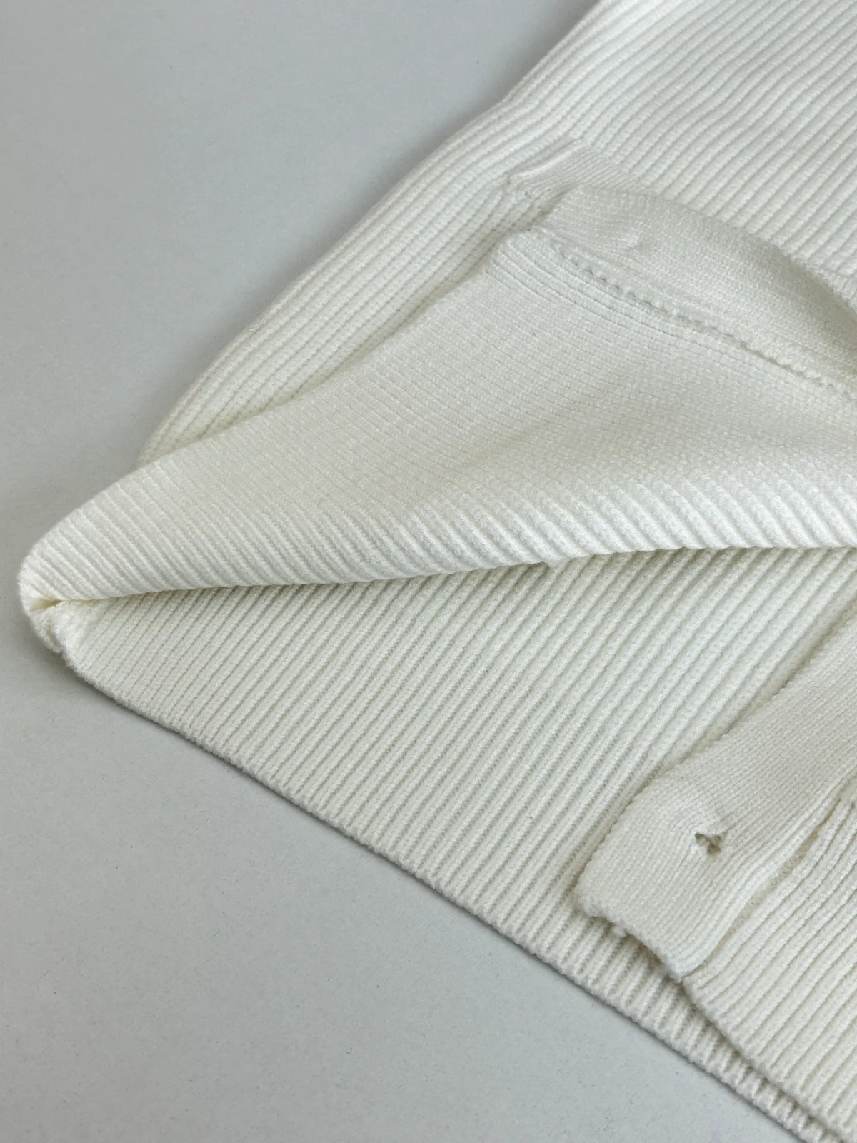 Knitted cardigan sweater with armband