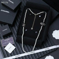 Elliptical pearl sweater chain