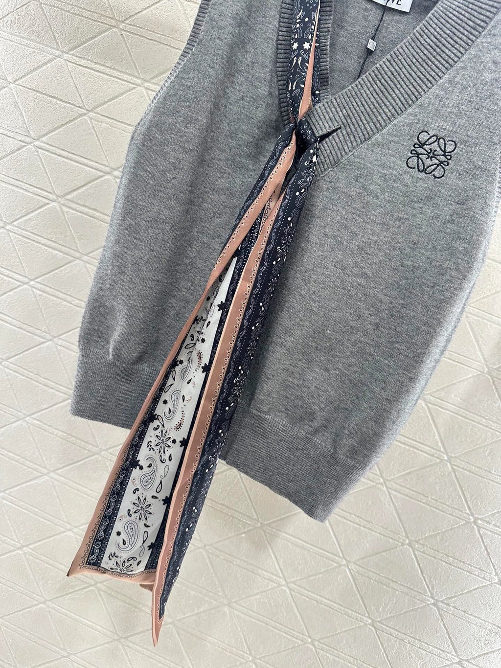 25 Scarf Knit Vest