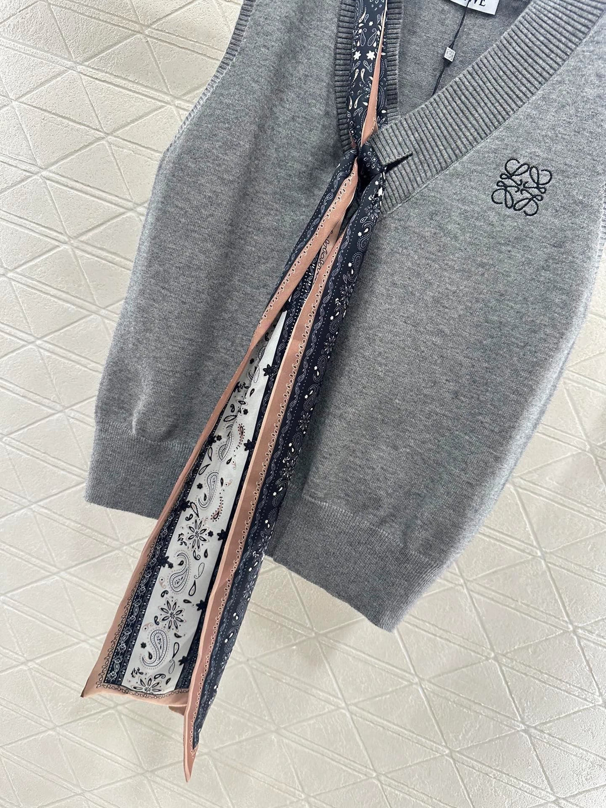 25 Scarf Knit Vest