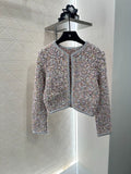 25 Knitted tweed cardigan and skirt set