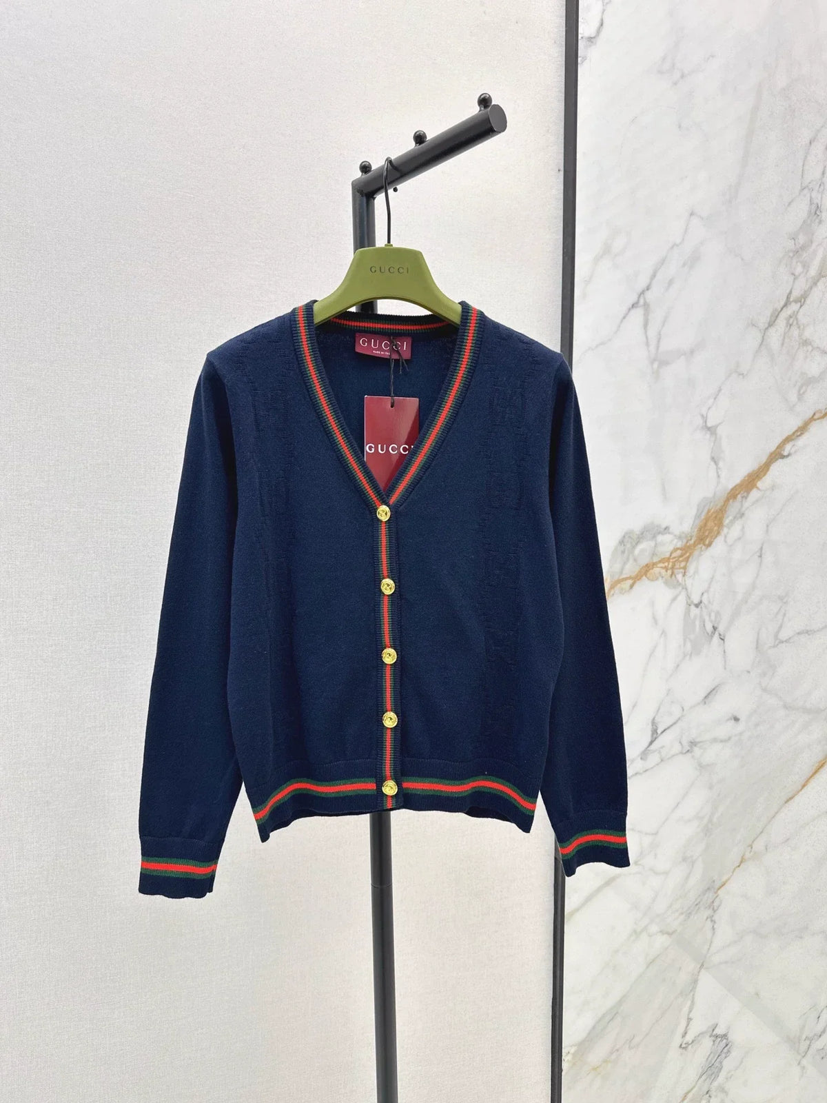 25 Knitted cardigan with woven pattern and V-neck