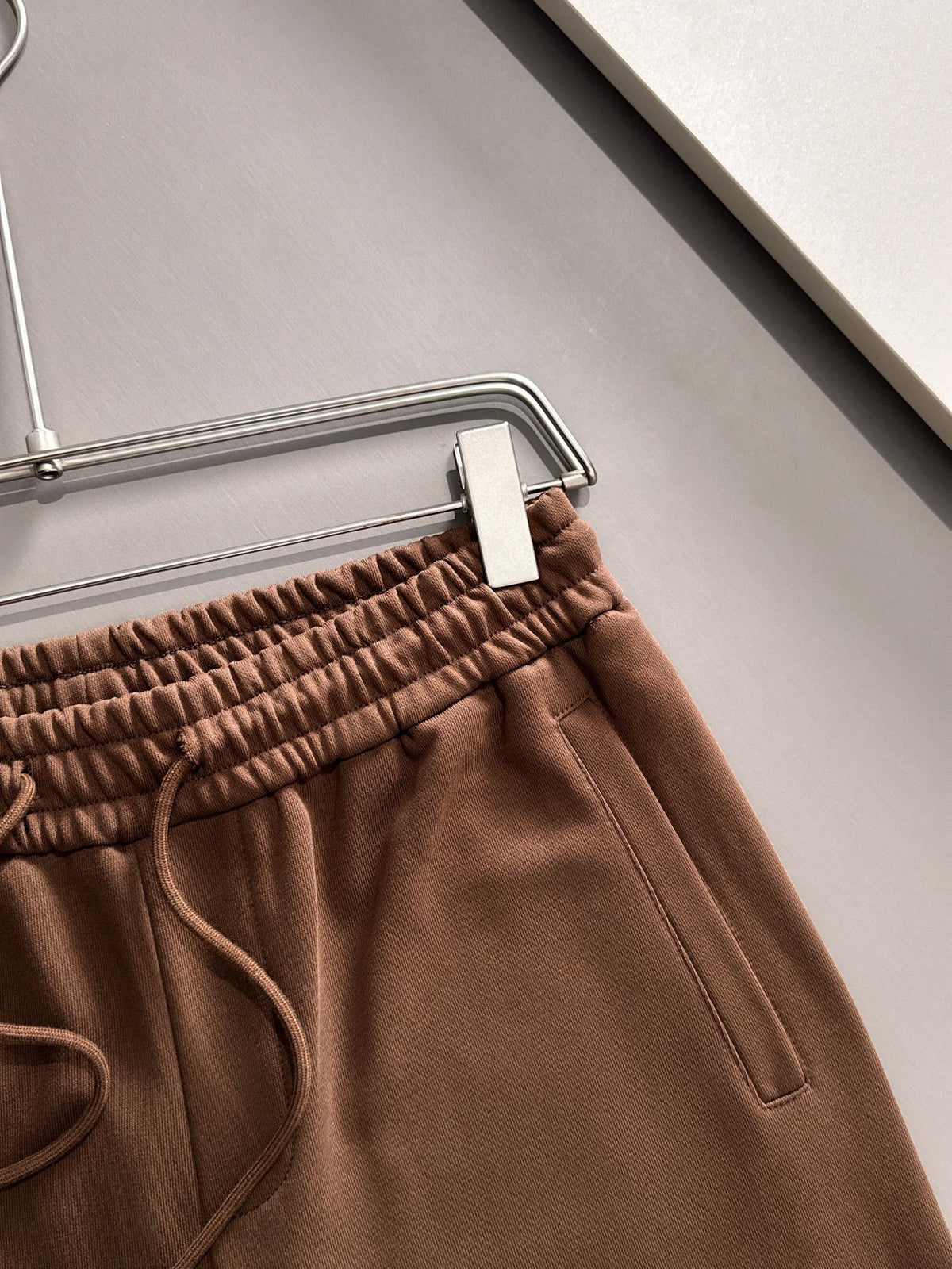 Classic woven ribbon splicing leather casual shorts