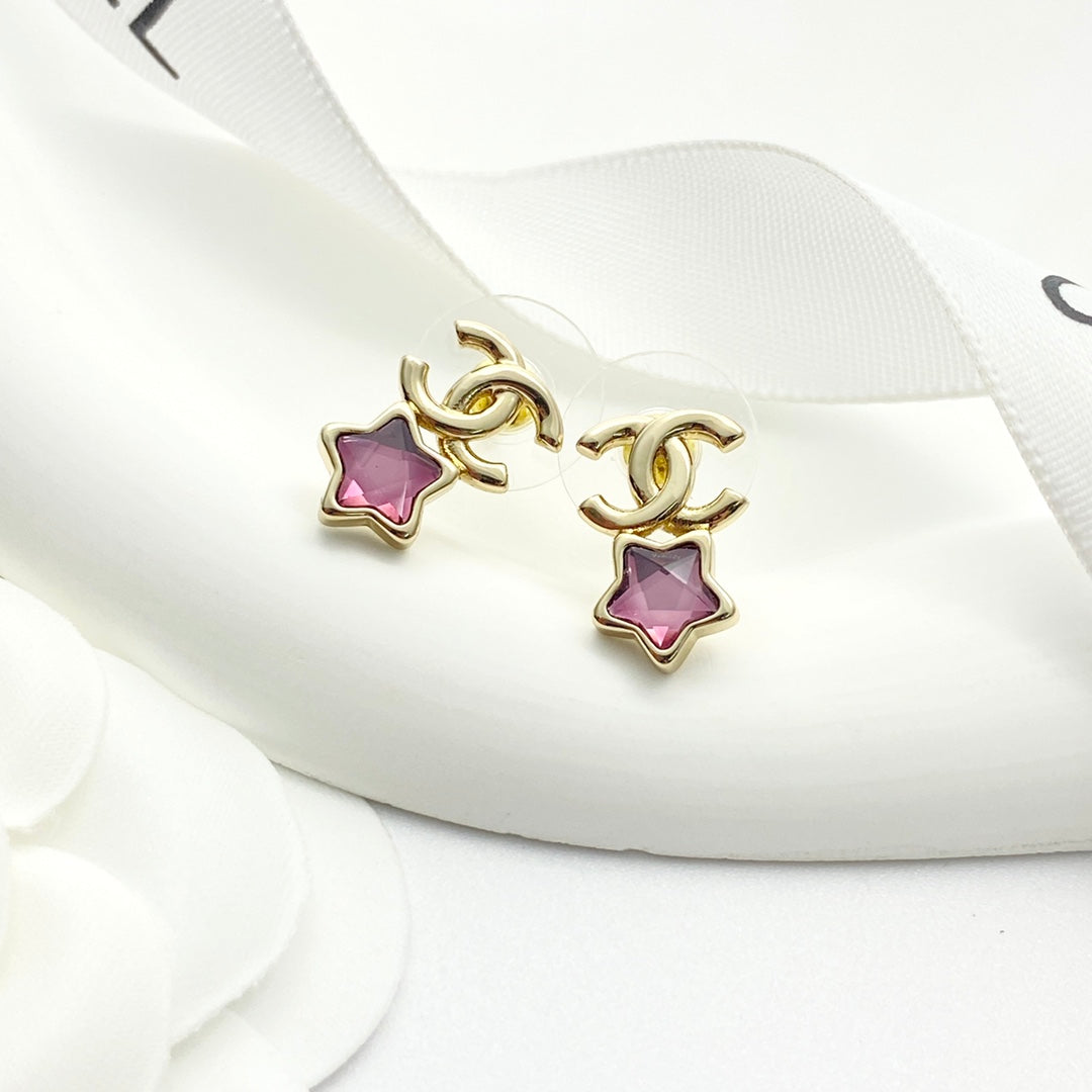 Pink diamond star earrings