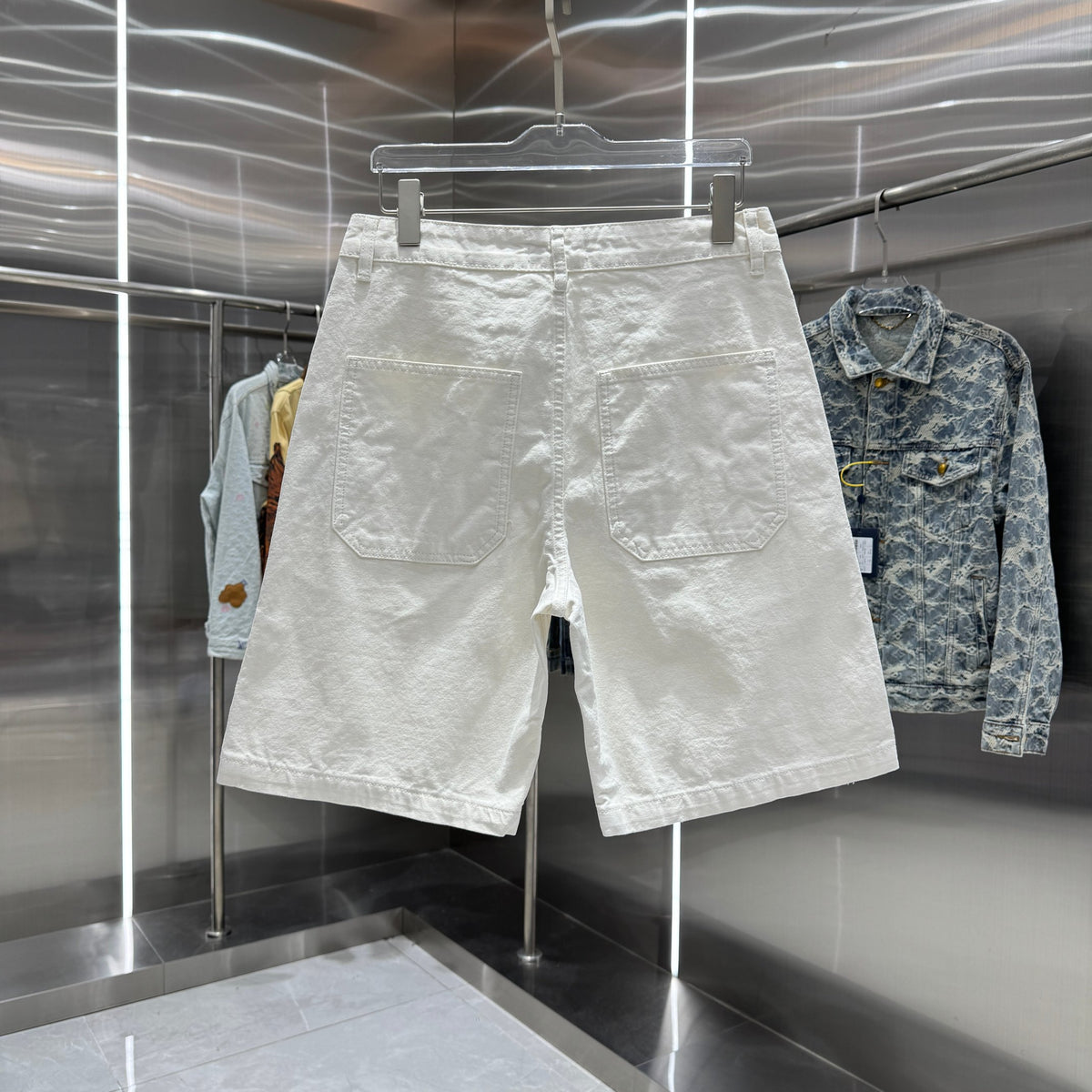Spliced cross denim shorts