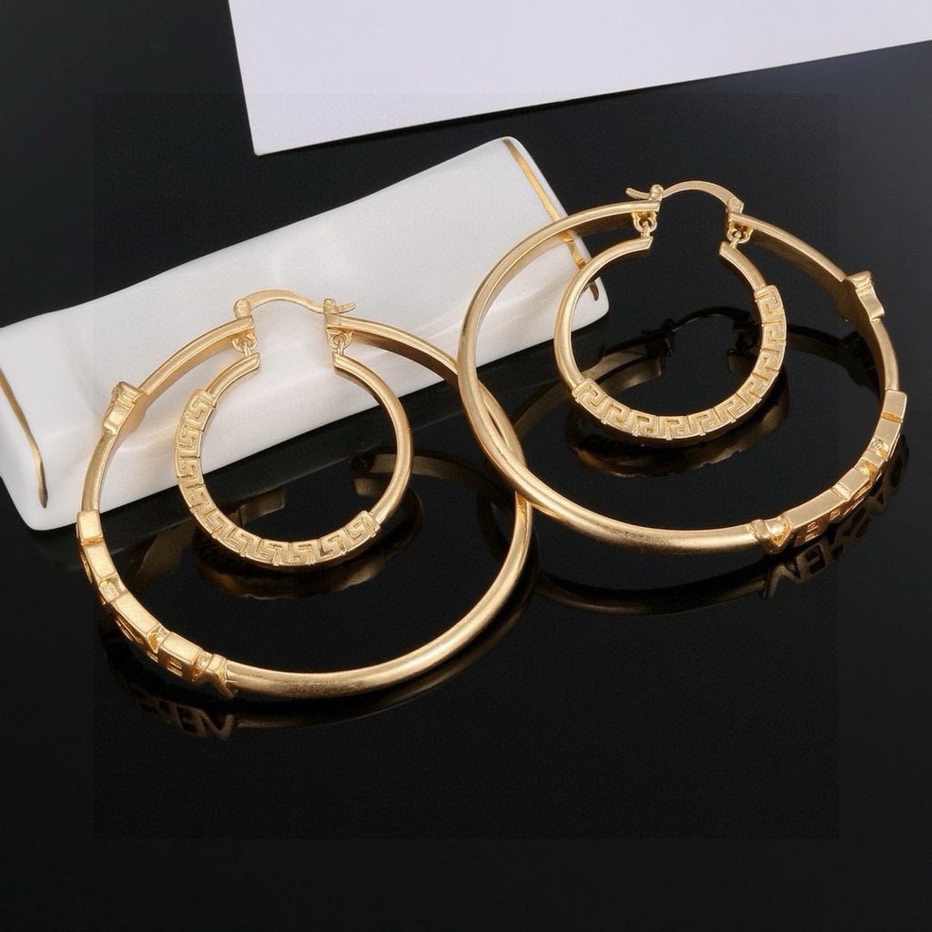 Carved vine patterned metal texture earrings