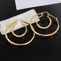 Carved vine patterned metal texture earrings