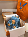 Blue denim double pocket triangular buckle backpack