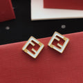 White square hollow earrings