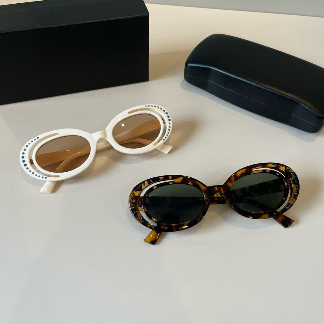 Explosive elliptical sunglasses