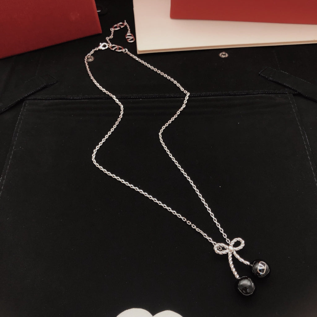 Black cherry bow necklace