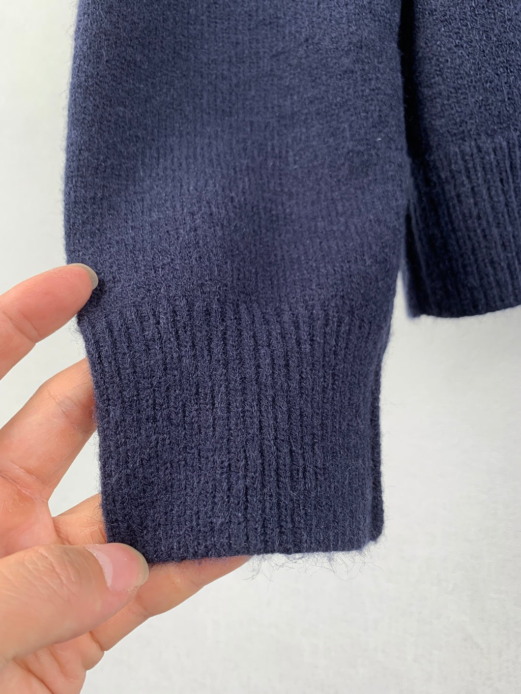 Solid color round neck cashmere knit sweater