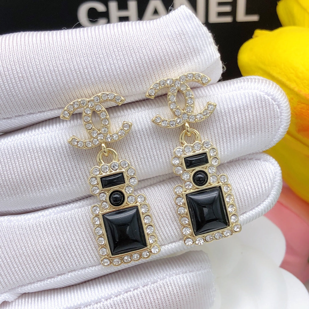 Perfume bottle earrings