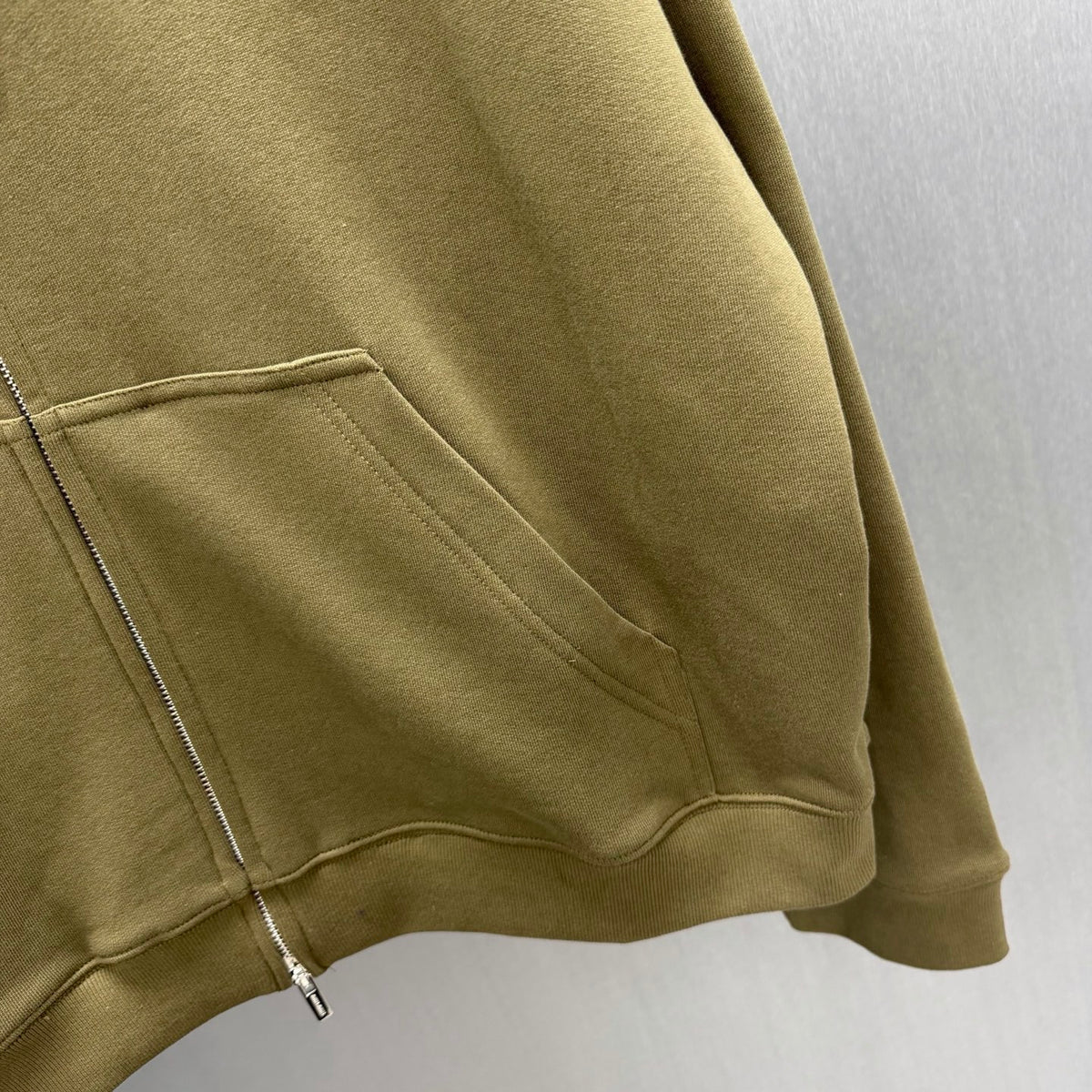 Adhesive hooded zipper hoodie