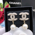 Hanging pearl earrings