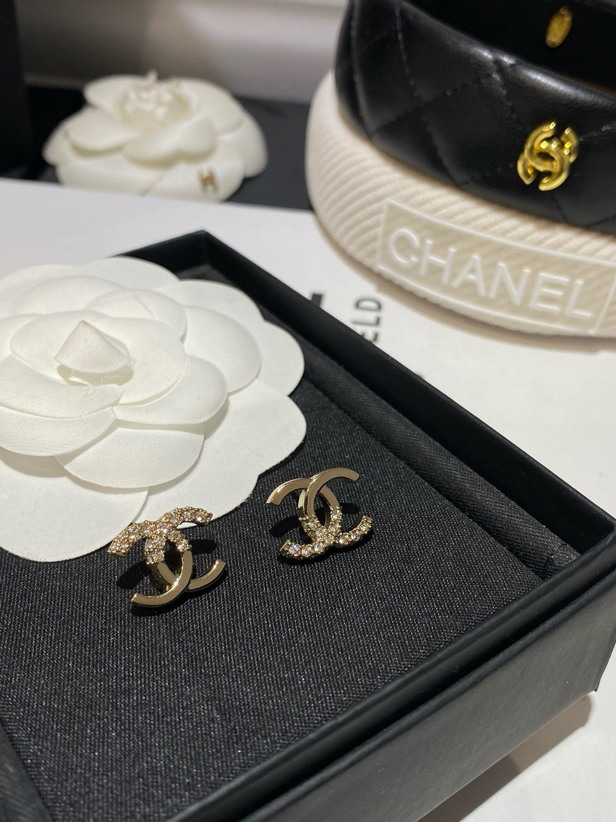 Half diamond gold earrings