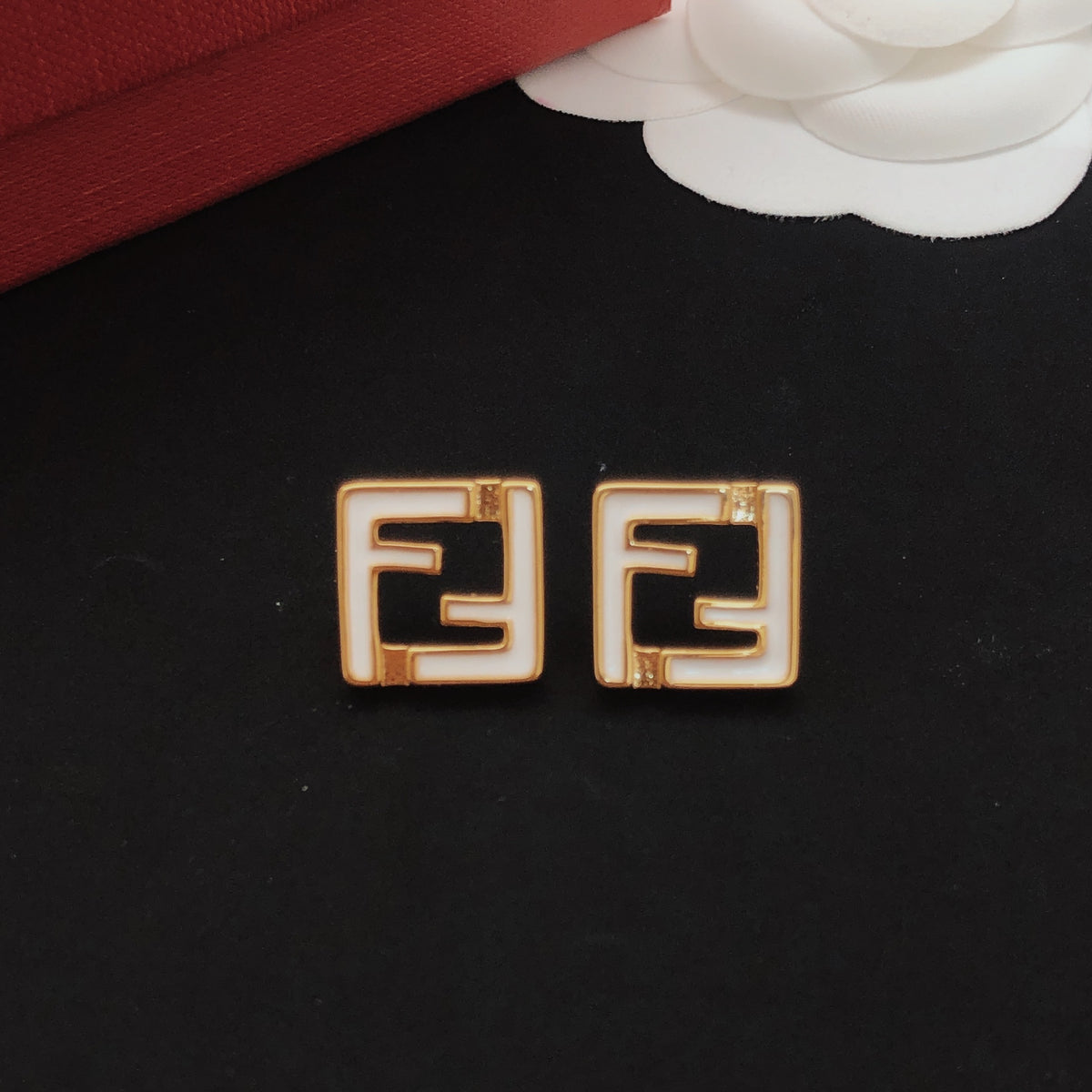 White square hollow earrings