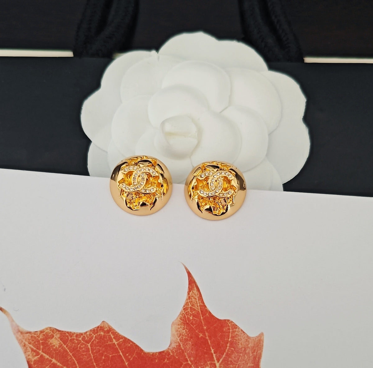 Golden spherical earrings