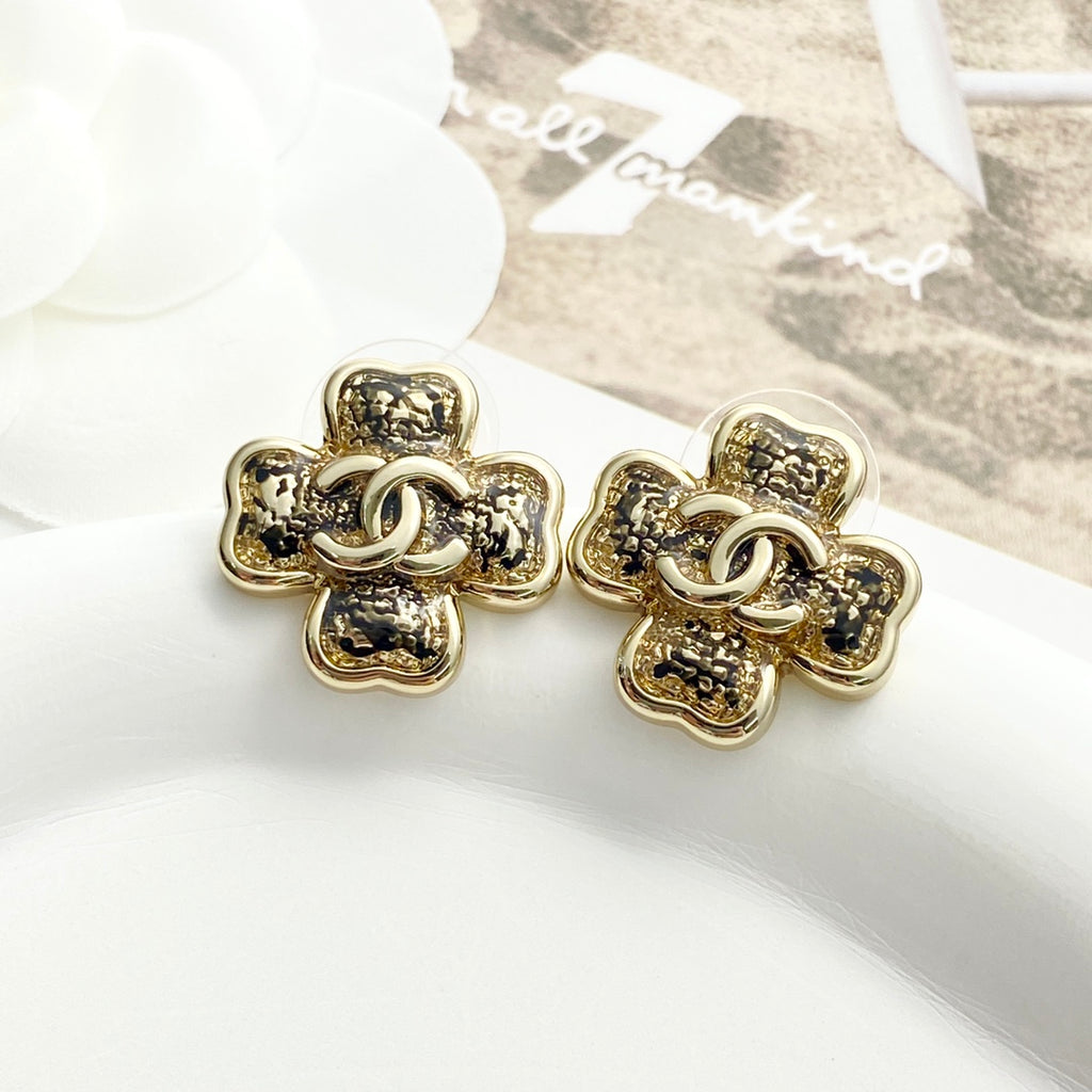 Black gold lace clover earrings