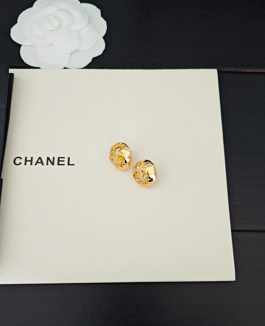 Golden spherical earrings