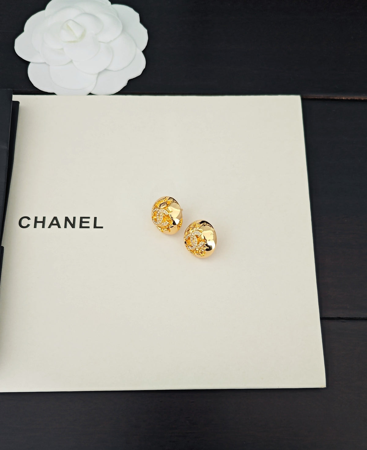 Golden spherical earrings