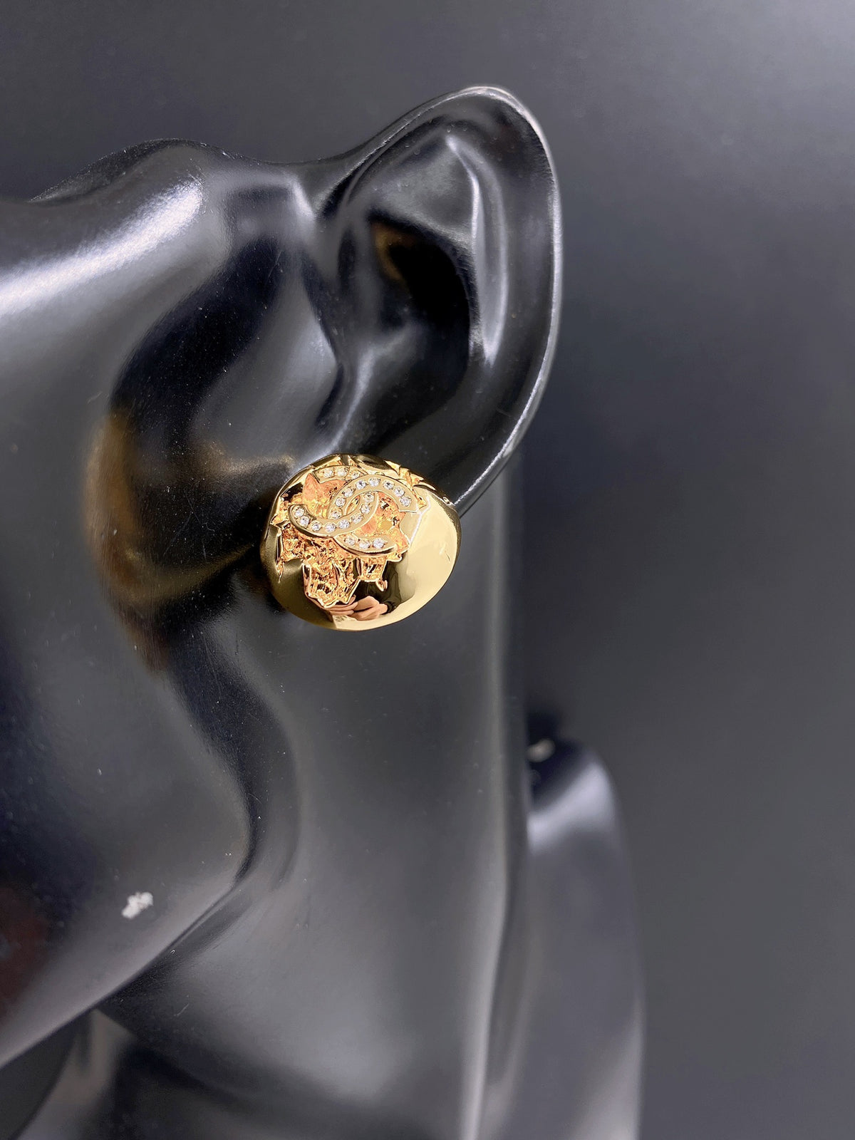 Golden spherical earrings