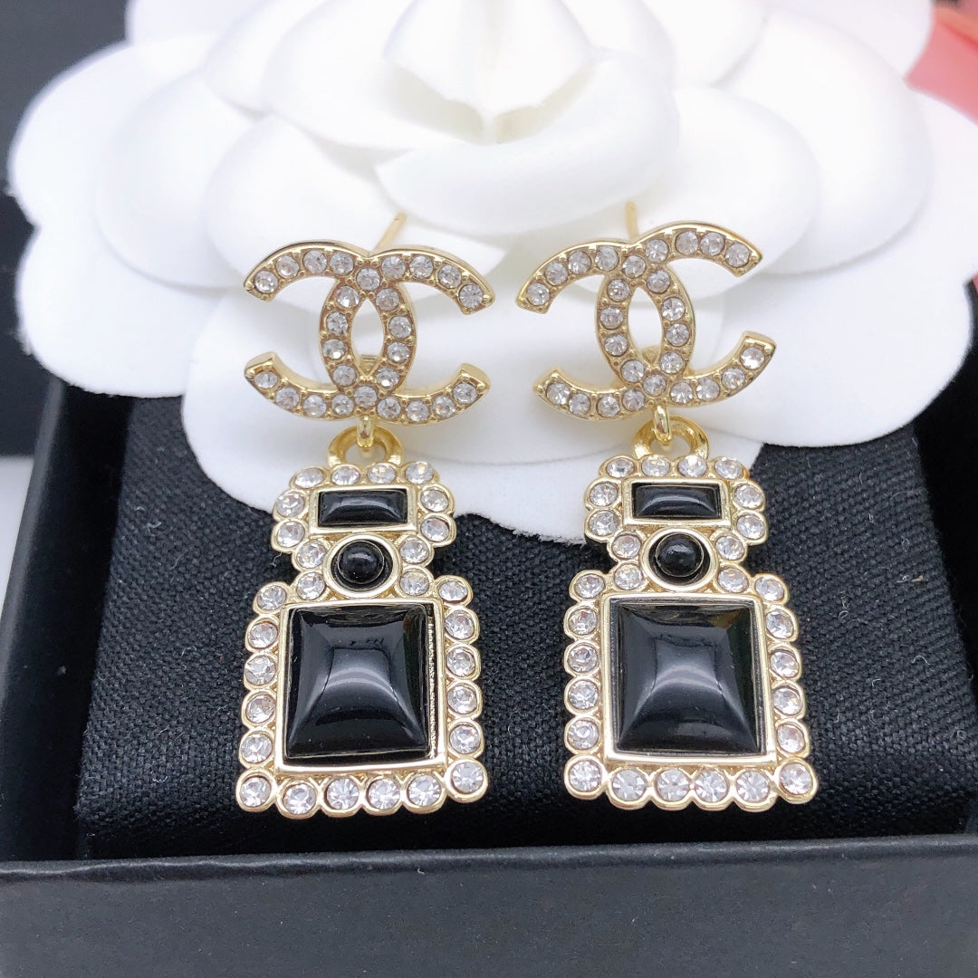 Perfume bottle earrings