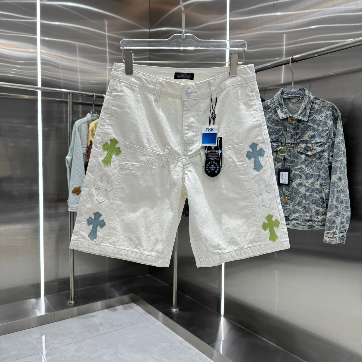 Spliced cross denim shorts