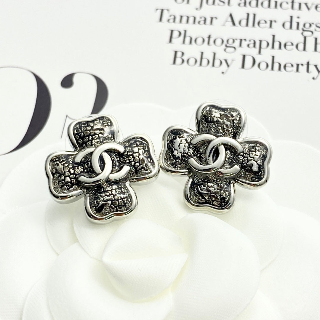 Black gold lace clover earrings