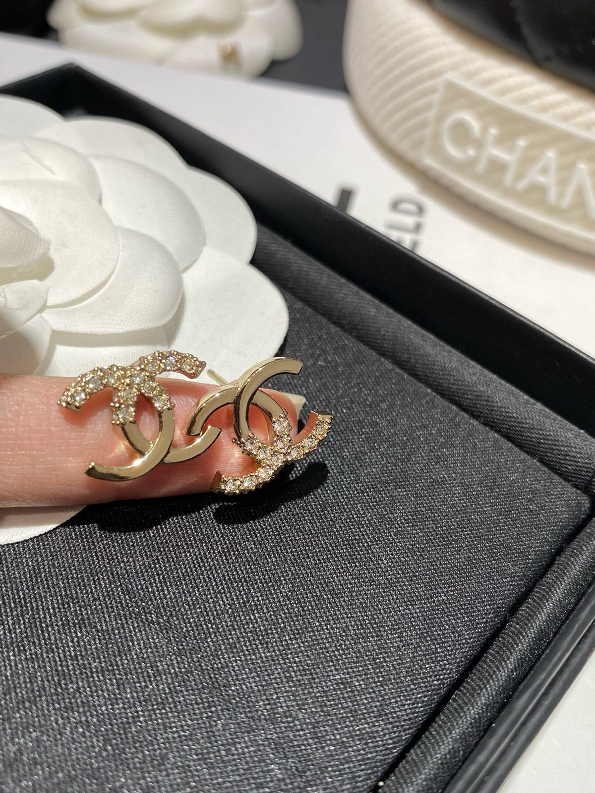 Half diamond gold earrings