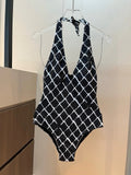 BIKINI SWIMSUIT SET IN WHITE CHECKERED PRINT ON BLACK BACKGROUND 624545