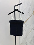 White floral top with black suspenders Vest
