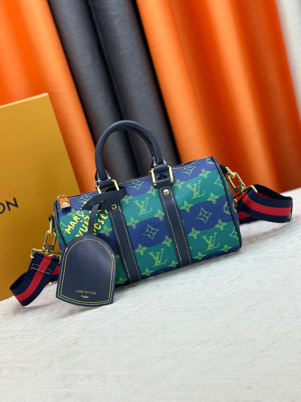 Blue green color blocked travel bag